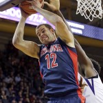 Arizona's Ryan Anderson grabs a rebound against Washington during the second half of an NCAA college basketball game Saturday, Feb. 6, 2016, in Seattle. (AP Photo/Elaine Thompson)