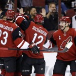 Arizona Coyotes' Oliver Ekman-Larsson (23), of Sweden; Brad Richardson (12); and Shane Doan, right, celebrate a goal by teammate Jordan Martinook against the Los Angeles Kings during the first period of an NHL hockey game Tuesday, Feb. 2, 2016, in Glendale, Ariz. (AP Photo/Ross D. Franklin)