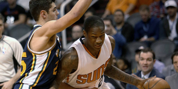 Phoenix Suns guard Archie Goodwin, right, drives on Utah Jazz guard Raul Neto during the third quar...