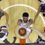 Washington's Marquese Chriss, center, dunks against Arizona during the first half of an NCAA college basketball game Saturday, Feb. 6, 2016, in Seattle. (AP Photo/Elaine Thompson)