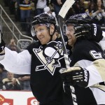 Pittsburgh Penguins' Patric Hornqvist, left, celebrates his third goal of an NHL hockey game against the Arizona Coyotes with teammate Phil Kessel (81) during the second period in Pittsburgh, Monday, Feb. 29, 2016. (AP Photo/Gene J. Puskar)