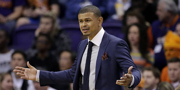 Phoenix Suns interim coach Earl Watson reacts during the second half of the team's NBA basketball g...