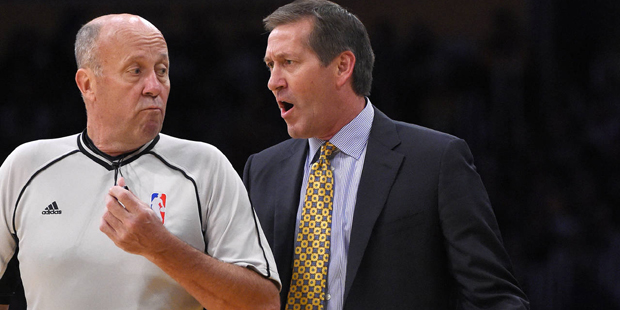 Phoenix Suns head coach Jeff Hornacek, right, talks with referee David Jones during the first half ...