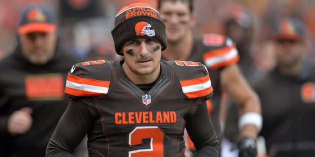 FILE - in this Dec. 6, 2015, file photo, Cleveland Browns quarterback Johnny Manziel walks off the ...