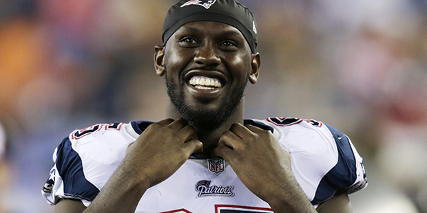 FILE - In this Aug. 22, 2014, file photo, New England Patriots defensive end Chandler Jones (95) jo...