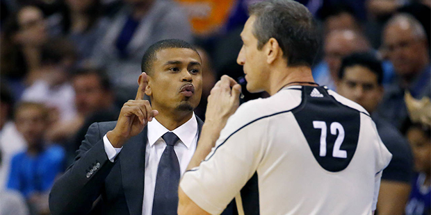 Phoenix Suns interim head coach Earl Watson gestures during the first half of an NBA basketball gam...