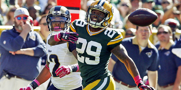 Green Bay Packers' Casey Hayward breaks up a pass intended for St. Louis Rams' Stedman Bailey durin...