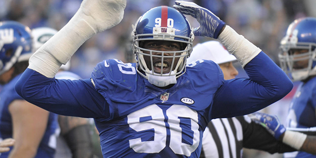 FILE - In this Dec. 6, 2015, file photo, New York Giants defensive end Jason Pierre-Paul reacts dur...