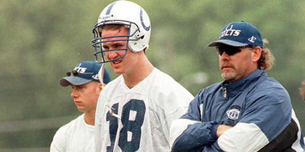 Indianapolis Colts Peyton Manning (18) and quarterbacks coach Bruce Arians are seen during Colts mi...