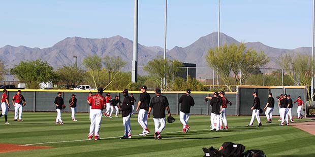 D-backs pitchers loosen up their arms before Wednesday’s night game against the Reds. (Photo by J...