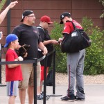 Tim Stauffer signs an autograph before the D-backs head to Surprise to play the Royals. (Photo by Jessica Watts/Cronkite News)