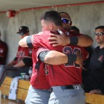 Yasmany Tomás (left) and Jake Lamb give each other a good luck hug before Thursday’s game against the Rockies.(Photo by Kylee Sam/Cronkite News)