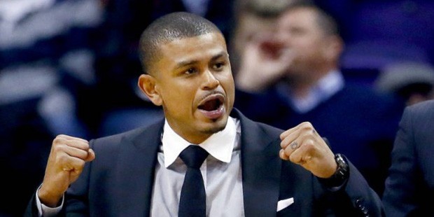 Phoenix Suns head coach Earl Watson, left, and assistant coach Corey Gaines react to a call during ...