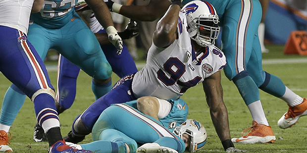 In this Nov. 14, 2014, file photo, Buffalo Bills defensive end Mario Williams (94) celebrates after...