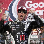 Kevin Harvick celebrates in victory lane after winning a NASCAR Sprint Cup Series auto race at Phoenix International Raceway, Sunday, March 13, 2016, in Avondale, Ariz. (AP Photo/Ross D. Franklin)