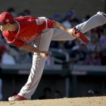 Los Angeles Angels relief pitcher Jose Alvarez throws against the Arizona Diamondbacks during first inning of a spring baseball game in Scottsdale, Ariz., Tuesday, March 8, 2016. (AP Photo/Chris Carlson)
