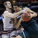 Green Bay guard Jordan Fouse, right, drives against Texas A&M guard Alex Caruso, left, in the second half of a first-round men's college basketball game in the NCAA Tournament, Friday, March 18, 2016, in Oklahoma City. (AP Photo/Sue Ogrocki)
