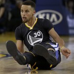 Golden State Warriors' Stephen Curry falls after scoring against the Phoenix Suns during the first half of an NBA basketball game Saturday, March 12, 2016, in Oakland, Calif. (AP Photo/Ben Margot)