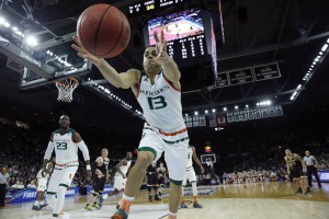 Miami's Angel Rodriguez chases a loose ball during the second half of a second-round game against Wichita State in the NCAA men's college basketball tournament in Providence, R.I., Saturday, March 19, 2016. Miami won 65-57. (AP Photo/Michael Dwyer)