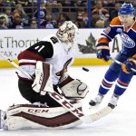 Arizona Coyotes' goalie Mike Smith (41) makes a save on Edmonton Oilers' Leon Draisaitl (29) during the second period of an NHL hockey game in Edmonton, Alberta, Saturday, March 12, 2016. (Jason Franson/The Canadian Press via AP) MANDATORY CREDIT