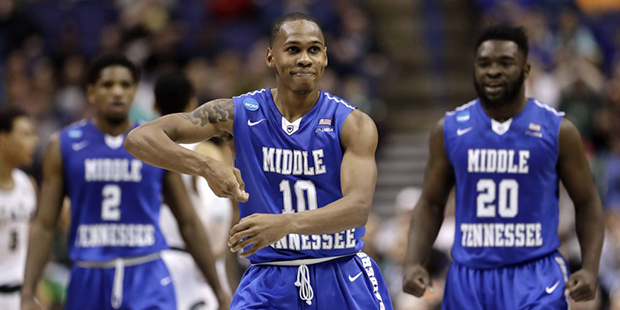 Middle Tennessee's Jaqawn Raymond (10) celebrates after making a basket during the first half of a ...