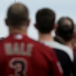 The Arizona Diamondbacks stand for the national anthem before a spring training baseball game against the Seattle Mariners Monday, March 7, 2016, in Peoria, Ariz. (AP Photo/Charlie Riedel)