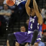 Stephen F. Austin guard Ty Charles (4) dunks during the first half of a second-round NCAA men's college basketball tournament game against Notre Dame, Sunday, March 20, 2016, in New York. (AP Photo/Kathy Willens)