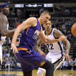 Phoenix Suns center Alex Len, center, loses control of the ball against while defended by Memphis Grizzlies forwards Zach Randolph, left, and Matt Barnes (22) in the first half of an NBA basketball game Sunday, March 6, 2016, in Memphis, Tenn. (AP Photo/Brandon Dill)