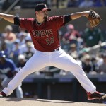 Arizona Diamondbacks starting pitcher Zack Godley (52) throws against the Los Angeles Dodgers during the first inning of a spring training baseball game in Scottsdale, Ariz., Friday, March 18, 2016. (AP Photo/Jeff Chiu)
