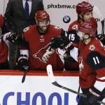 Arizona Coyotes' Martin Hanzal (11), of the Czech Republic, celebrates his goal with Sergei Plotnikov (61), of Russia; Anthony Duclair, second from left; Boyd Gordon (15); and Jordan Martinook (48) during the third period of an NHL hockey game against the Dallas Stars on Thursday, March 24, 2016, in Glendale, Ariz. Hanzal scored two goals on the night, his 100th and 101st in the league, as the Coyotes defeated the Stars 3-1. (AP Photo/Ross D. Franklin)