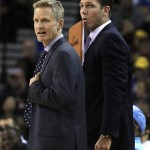 Golden State Warriors coach Steve Kerr, left, and assistant coach Luke Walton watch during the second half of the team's NBA basketball game against the Phoenix Suns on Saturday, March 12, 2016, in Oakland, Calif. (AP Photo/Ben Margot)