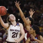 Arizona State's Sophie Brunner (21) passes out of the post against New Mexico State's Tyler Ellis during a college basketball game in the NCAA women's tournament, Friday, March 18, 2016, in Tempe, Ariz. (Patrick Breen/The Arizona Republic via AP)