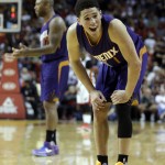 Phoenix Suns guard Devin Booker (1) reacts to a call by an official against his team during the second half of an NBA basketball game against the Miami Heat, Thursday, March 3, 2016, in Miami. (AP Photo/Alan Diaz)