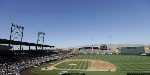 Fans at Salt River Fields at Talking Stick watch a spring training baseball game between the Arizon...
