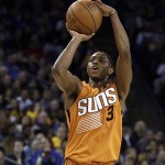 Phoenix Suns' Brandon Knight shoots against the Golden State Warriors during the second half of an NBA basketball game Saturday, March 12, 2016, in Oakland, Calif. (AP Photo/Ben Margot)