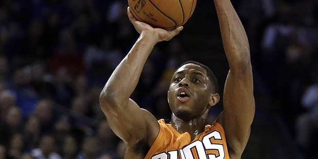 Phoenix Suns' Brandon Knight shoots against the Golden State Warriors during the second half of an ...