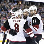 Arizona Coyotes celebrate a goal against the Edmonton Oilers during the first period of an NHL hockey game in Edmonton, Alberta, Saturday, March 12, 2016. (Jason Franson/The Canadian Press via AP) MANDATORY CREDIT