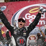 Kevin Harvick celebrates in victory lane after winning a NASCAR Sprint Cup Series auto race at Phoenix International Raceway Sunday, March 13, 2016, in Avondale, Ariz. (AP Photo/Ross D. Franklin)