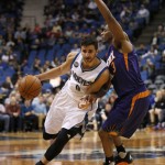 Minnesota Timberwolves guard Ricky Rubio (9), of Spain, drives against Phoenix Suns guard Brandon Knight (3) during the second half of an NBA basketball game in Minneapolis, Monday, March 28, 2016. The Timberwolves won 121-116. (AP Photo/Ann Heisenfelt)