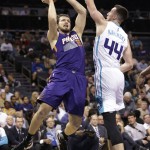 Phoenix Suns' Mirza Teletovic (35) shoots over Charlotte Hornets' Frank Kaminsky III during the first half of an NBA basketball game in Charlotte, N.C., Tuesday, March 1, 2016. (AP Photo/Chuck Burton)