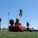 Arizona Diamondbacks' Brett Hayes, center, stretches out with other teammates prior to a spring training baseball game against the San Diego Padres, Tuesday, March 8, 2016, in Peoria, Ariz. (AP Photo/Ross D. Franklin)