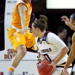 Tennessee guard Andraya Carter jumps trying to stop Arizona State guard Katie Hempen (0) during the first half of a second-round NCAA women's college basketball game, Sunday, March 20, 2016, in Tempe, Ariz. (AP Photo/Matt York)