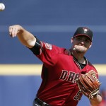Arizona Diamondbacks' Zack Godley warms up during the second inning of a spring training baseball game against the San Diego Padres, Tuesday, March 8, 2016, in Peoria, Ariz. (AP Photo/Ross D. Franklin)