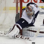 Colorado Avalanche goalie Semyon Varlamov, of Russia, makes a stick save of a shot against the Arizona Coyotes in the second period of an NHL hockey game Monday, March 7, 2016, in downtown Denver. (AP Photo/David Zalubowski)