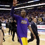 Los Angeles Lakers forward Kobe Bryant leaves the court after the Lakers' NBA basketball game against the Phoenix Suns, Wednesday, March 23, 2016, in Phoenix. The Suns won 119-107 in Bryant's final game in Phoenix. (AP Photo/Matt York)