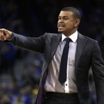 Phoenix Suns coach Earl Watson gestures during the first half of the team's NBA basketball game against the Golden State Warriors on Saturday, March 12, 2016, in Oakland, Calif. (AP Photo/Ben Margot)
