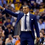 Phoenix Suns head coach Earl Watson makes a call during the first half of an NBA basketball game against the Los Angeles Lakers, Wednesday, March 23, 2016, in Phoenix. (AP Photo/Matt York)