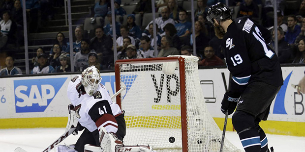 Arizona Coyotes goalie Mike Smith (41) is beaten for a goal on a shot from San Jose Sharks' Brenden...