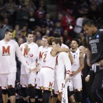 Maryland players celebrate after winning a second-round men's college basketball game against Hawaii in the NCAA Tournament in Spokane, Wash., Sunday, March 20, 2016. Maryland won 73-60. (AP Photo/Young Kwak)