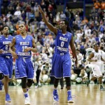 Middle Tennessee Darnell Harris (0), Jaqawn Raymond (10 ) and  Perrin Buford (2) celebrate as they walk off the court after winning a first-round men's college basketball game against Michigan State in the NCAA Tournament, Friday, March 18, 2016, in St. Louis. Middle Tennessee won 90-81. (AP Photo/Charlie Riedel)
